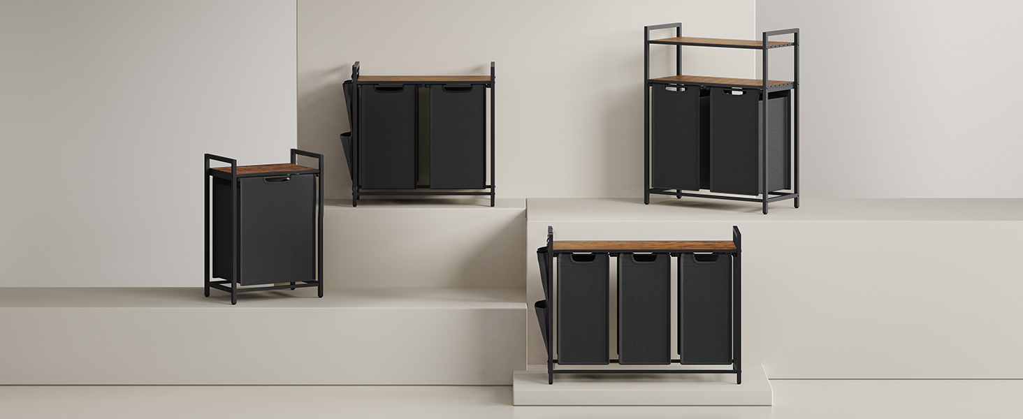 Four black metal planters with geometric frame designs displayed on white surface in varying heights and sizes.